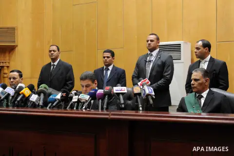 Egyptian Judges attend the trial of Egypt's ousted Islamist president Mohamed Morsi in Cairo on May 7, 2016. An Egyptian court recommended death sentences for six codefendants of Mohamed Morsi but not for the ousted Isla...