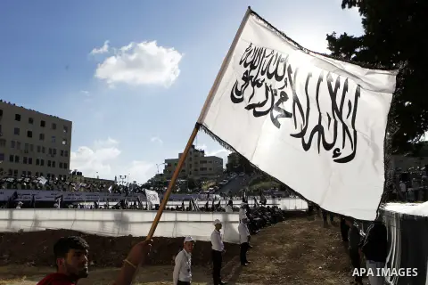 Palestinian supporters of the Islamist party Hizb Ut-Tahrir take part in a rally to mark the 95th anniversary of the overthrow of the Islamic Caliphate, in the West Bank city of Hebron on May 7, 2016. Photo by Wisam Hash...