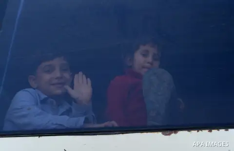 Palestinians wait at the Rafah border crossing with Egypt, in the southern Gaza Strip, after it was opened for two days by Egyptian authorities on May 12, 2016. Israeli Defence Minister Moshe Yaalon announced on May 2, 2...