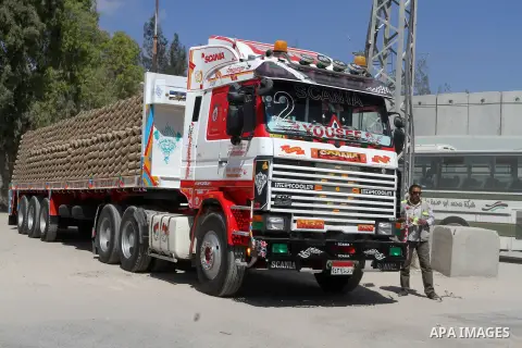 A truck loded with cement enters from Egypt through the Rafah border crossing in southern Gaza Strip on May 12, 2016. Israeli Defence Minister Moshe Yaalon announced on May 2, 2016 the reopening of the Erez crossing poin...