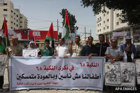 Palestinians wave national flags on May 15, 2016 in Gaza city during a rally to commemorate the "Nakba" or "catastrophe" in Arabic in reference to the establishment in 1948 of the state of Israel. "Nakba" means in Arabic...