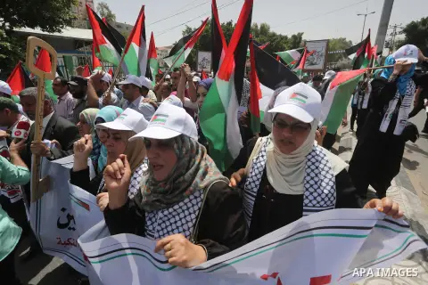 Palestinians wave national flags on May 15, 2016 in Gaza city during a rally to commemorate the "Nakba" or "catastrophe" in Arabic in reference to the establishment in 1948 of the state of Israel. "Nakba" means in Arabic...