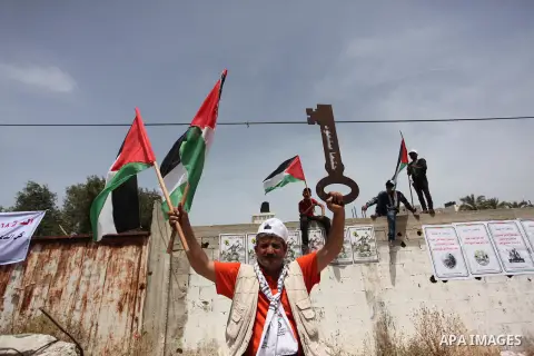 Palestinians wave national flags on May 15, 2016 in Gaza city during a rally to commemorate the "Nakba" or "catastrophe" in Arabic in reference to the establishment in 1948 of the state of Israel. "Nakba" means in Arabic...