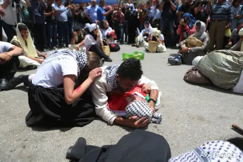 Palestinians re-enact a scene from the 1948 Nakba during a rally marking the 68th anniversary of the Nakba in the West Bank city of Ramallah May 15, 2016. "Nakba" means in Arabic "catastrophe" in reference to the birth o...