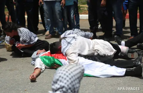 Palestinians re-enact a scene from the 1948 Nakba during a rally marking the 68th anniversary of the Nakba in the West Bank city of Ramallah May 15, 2016. "Nakba" means in Arabic "catastrophe" in reference to the birth o...