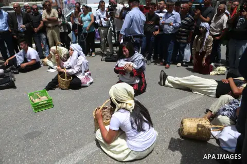 Palestinians re-enact a scene from the 1948 Nakba during a rally marking the 68th anniversary of the Nakba in the West Bank city of Ramallah May 15, 2016. "Nakba" means in Arabic "catastrophe" in reference to the birth o...
