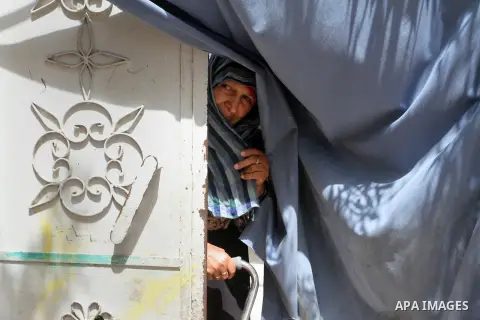 A Palestinian woman stands outside her house on the 68th anniversary of the "Nakba" in the southern Gaza Strip town of Khan Younis on May 15, 2016. "Nakba" means in Arabic "catastrophe" in reference to the birth of the s...