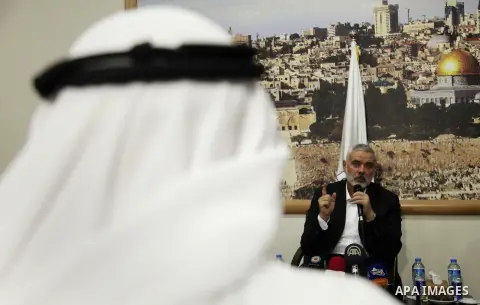 Senior Hamas leader Ismail Haniyeh, speaks during a meeting with Gaza Strip's notables in Gaza city, on May 17, 2016. Photo by Ashraf Amra