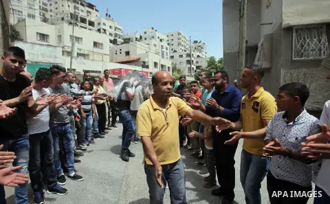 Palestinian friends and relatives celebrated the groom, Mahran Abu Rish, in the West Bank city of Nablus on the eve of his wedding on May 21, 2016, during the traditional celebration, Abu Rish, was first taken by relativ...