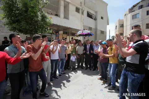 Palestinian friends and relatives celebrated the groom, Mahran Abu Rish, in the West Bank city of Nablus on the eve of his wedding on May 21, 2016, during the traditional celebration, Abu Rish, was first taken by relativ...