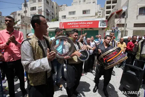 Palestinian friends and relatives celebrated the groom, Mahran Abu Rish, in the West Bank city of Nablus on the eve of his wedding on May 21, 2016, during the traditional celebration, Abu Rish, was first taken by relativ...