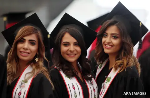 Palestinian students attend their graduation ceremony at the end of the academic year on May 21, 2016 at Birzeit University in the West Bank town of Birzeit, near Ramallah. Photo by Shadi Hatem
