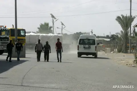 Loaded trucks cross the Kerem Shalom crossing to Rafah in southern Gaza Strip on May 23, 2016. Israel said on May 22 it was lifting a ban imposed last month on private imports of cement to the Hamas-run Gaza Strip. The b...