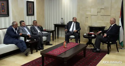 Palestinian Prime Minister, Rami Hamdallah, meets with Arab-Israeli Knesset member,Ahmad al-Tib, in the West Bank city of Ramallah, on May 23, 2016. Photo by Prime Minister Office