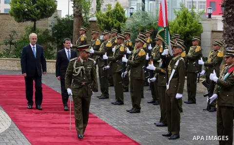 Palestinian Prime Minister Rami Hamdallah and French Prime Minister Manuel Valls, arrive for a meeting in the West Bank city of Ramallah, on May 24, 2016. Photo by Prime Minister Office