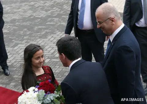 Palestinian Prime Minister Rami Hamdallah and French Prime Minister Manuel Valls, arrive for a meeting in the West Bank city of Ramallah, on May 24, 2016. Photo by Prime Minister Office