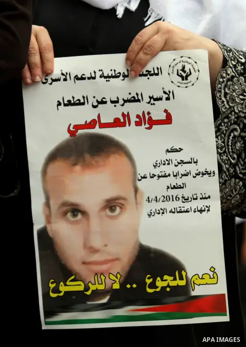 Palestinian relatives of patient prisoners in Israeli jails take part in a protest demanding for their release,in the West Bank city of Nablus on May 26, 2016. Photo by Nedal Eshtayah