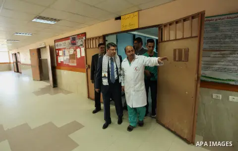 Turkish Consul, Mustafa Sarnic with Gerald Rockenschaub, Head of the WHO office in the occupied Palestinian territories visit al-Shifa hospital in Gaza City, on May 30, 2016. Photo by Ashraf Amra