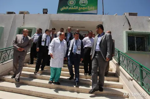 Turkish Consul, Mustafa Sarnic with Gerald Rockenschaub, Head of the WHO office in the occupied Palestinian territories visit al-Shifa hospital in Gaza City, on May 30, 2016. Photo by Ashraf Amra