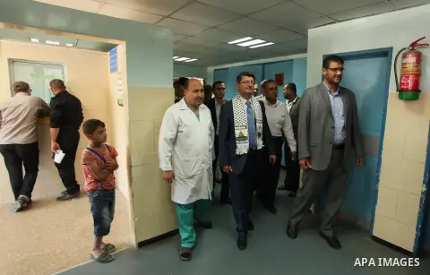 Turkish Consul, Mustafa Sarnic with Gerald Rockenschaub, Head of the WHO office in the occupied Palestinian territories visit al-Shifa hospital in Gaza City, on May 30, 2016. Photo by Ashraf Amra