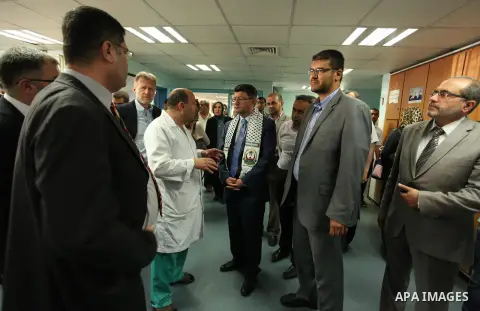 Turkish Consul, Mustafa Sarnic with Gerald Rockenschaub, Head of the WHO office in the occupied Palestinian territories visit al-Shifa hospital in Gaza City, on May 30, 2016. Photo by Ashraf Amra