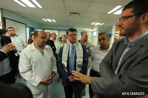 Turkish Consul, Mustafa Sarnic with Gerald Rockenschaub, Head of the WHO office in the occupied Palestinian territories visit al-Shifa hospital in Gaza City, on May 30, 2016. Photo by Ashraf Amra