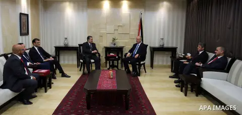 Palestinian Prime Minister Rami Hamdallah meets with Secretary General of the Moroccan independence party Hamid Chabat, in the West Bank city of Ramallah, on May 31, 2016.. Photo by Prime Minister Office
