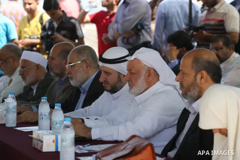 Members of the Palestinian legislative council from Hamas movement attend a meeting at the legislative council, at seaport of Gaza city, on 01 June 2016. Photo by Mohammed Asad