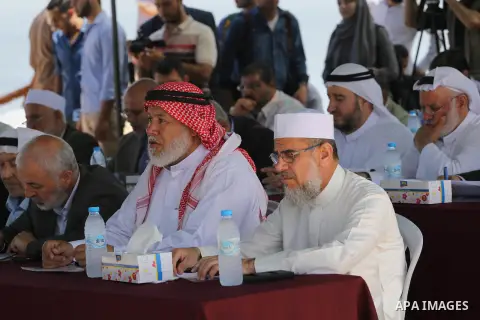 Members of the Palestinian legislative council from Hamas movement attend a meeting at the legislative council, at seaport of Gaza city, on 01 June 2016. Photo by Mohammed Asad