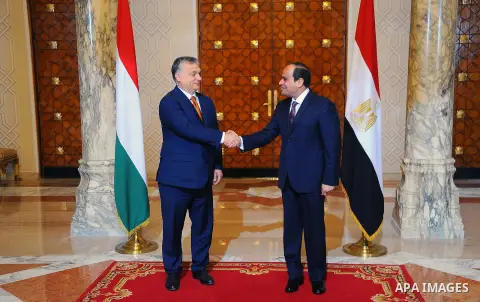 Egyptian President Abdel-Fattah al-Sisi shake hands with Hungarian Prime Minister Viktor Orban following a meeting at the presidential palace in Cairo, Egypt, on June 1, 2016. Photo by Egyptian President Office