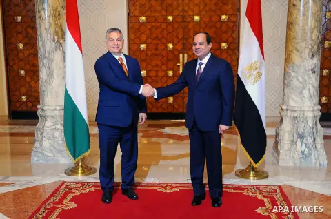 Egyptian President Abdel-Fattah al-Sisi shake hands with Hungarian Prime Minister Viktor Orban following a meeting at the presidential palace in Cairo, Egypt, on June 1, 2016. Photo by Egyptian President Office