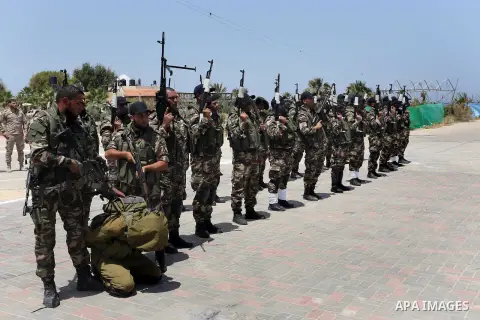 Member of Palestinian security forces display their skills during a military graduation ceremony in Gaza City June 2, 2016. Photo by Mohammed Asad