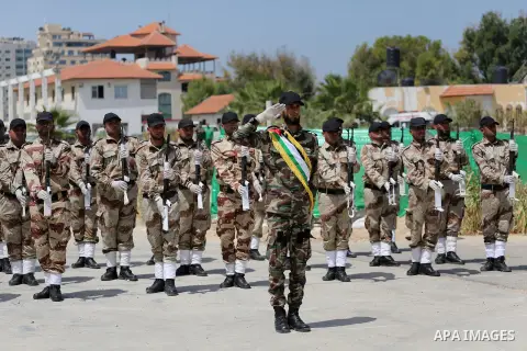 Member of Palestinian security forces display their skills during a military graduation ceremony in Gaza City June 2, 2016. Photo by Mohammed Asad