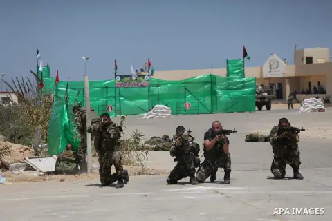 Member of Palestinian security forces display their skills during a military graduation ceremony in Gaza City June 2, 2016. Photo by Mohammed Asad