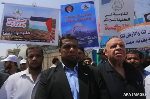 Palestinians take part in a protest to mark Naksa Day (setback), in front of the headquarter United Nation "UNSCO" in Gaza City, on June 04, 2016. Palestinians mark "Naksa Day" to mourn the 49th anniversary of Israel's o...