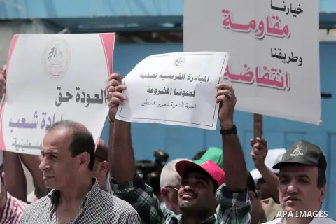 Palestinians take part in a protest to mark Naksa Day (setback), in front of the headquarter United Nation "UNSCO" in Gaza City, on June 04, 2016. Palestinians mark "Naksa Day" to mourn the 49th anniversary of Israel's o...