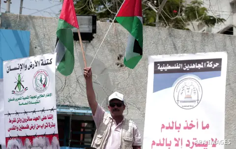 Palestinians take part in a protest to mark Naksa Day (setback), in front of the headquarter United Nation "UNSCO" in Gaza City, on June 04, 2016. Palestinians mark "Naksa Day" to mourn the 49th anniversary of Israel's o...