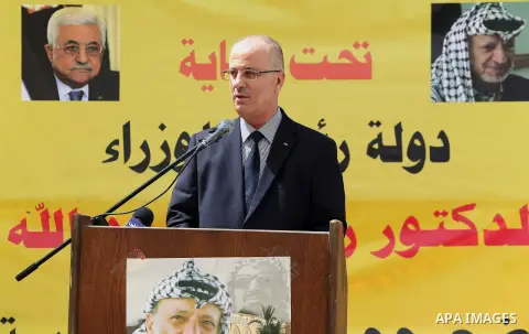 Palestinian Prime Minister Rami Hamdallah puts the corner stone for the Martyrs of the High school for Girls in the West Bank city of Nablus on June 4.2016 Photo by Prime Minister Office