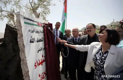 Palestinian Prime Minister Rami Hamdallah puts the corner stone for the Martyrs of the High school for Girls in the West Bank city of Nablus on June 4.2016 Photo by Prime Minister Office