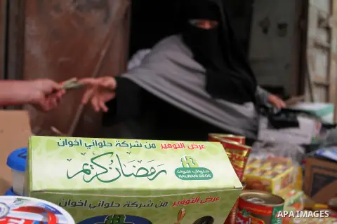 Palestinians shop at a traditional market in preparation for the holy month of Ramadan in Rafah in the southern Gaza strip on June 4,2016. Muslims around the world refrain from eating, drinking and sexual intercourse fro...