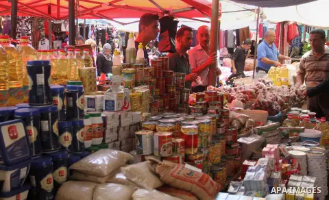 Palestinians shop at a traditional market in preparation for the holy month of Ramadan in Rafah in the southern Gaza strip on June 4,2016. Muslims around the world refrain from eating, drinking and sexual intercourse fro...