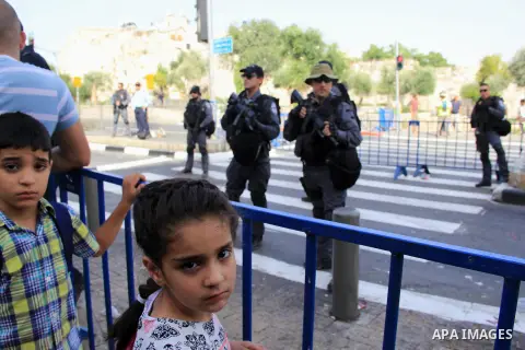 Israeli security forces stand guard during an annual march marking Israel's 1967 seizure of the Palestinian-dominated eastern half of Jerusalem, outside Damascus Gate in Jerusalem's old city on June 5, 2016. Israel occup...
