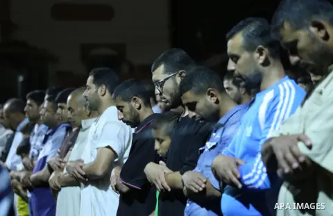 Palestinian Muslim worshipers perform "Taraweeh", nightly prayer of the month of Ramadan, at al-Tawfeq mosque which was destroyed during the 50-day war between Israel and Hamas militants in the summer of 2014, in Shajaiy...