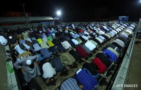 Palestinian Muslim worshipers perform "Taraweeh", nightly prayer of the month of Ramadan, at al-Tawfeq mosque which was destroyed during the 50-day war between Israel and Hamas militants in the summer of 2014, in Shajaiy...