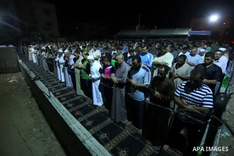Palestinian Muslim worshipers perform "Taraweeh", nightly prayer of the month of Ramadan, at al-Tawfeq mosque which was destroyed during the 50-day war between Israel and Hamas militants in the summer of 2014, in Shajaiy...