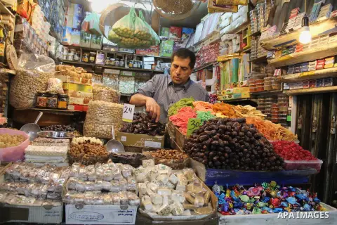 Palestinians shop at a market on the second day of the Ramadan in Jerusalem's old city on June 7, 2016. Ramadan is sacred to Muslims because it is during that month that tradition says the Koran was revealed to the Proph...