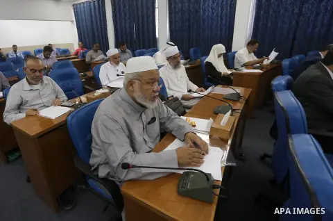 Members of the Palestinian legislative council from Hamas movement attend a meeting at the legislative council in Gaza city on June 8, 2016. Photo by Mohammed Asad