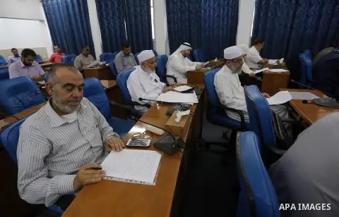 Members of the Palestinian legislative council from Hamas movement attend a meeting at the legislative council in Gaza city on June 8, 2016. Photo by Mohammed Asad