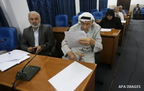 Members of the Palestinian legislative council from Hamas movement attend a meeting at the legislative council in Gaza city on June 8, 2016. Photo by Mohammed Asad