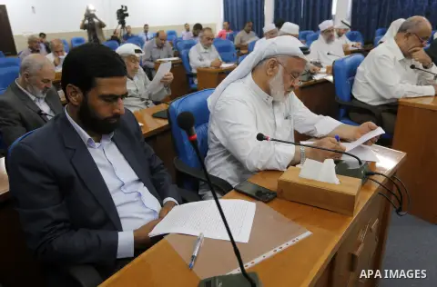Members of the Palestinian legislative council from Hamas movement attend a meeting at the legislative council in Gaza city on June 8, 2016. Photo by Mohammed Asad